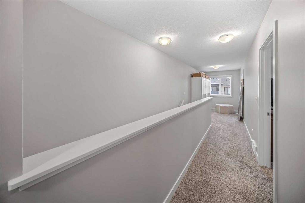 210 Crestbrook Common Sw, Calgary, AB - Indoor Photo Showing Other Room