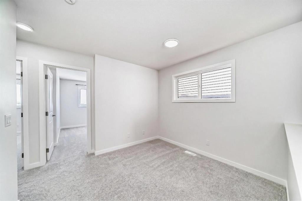 615 Lucas Boulevard Nw, Calgary, AB - Indoor Photo Showing Other Room