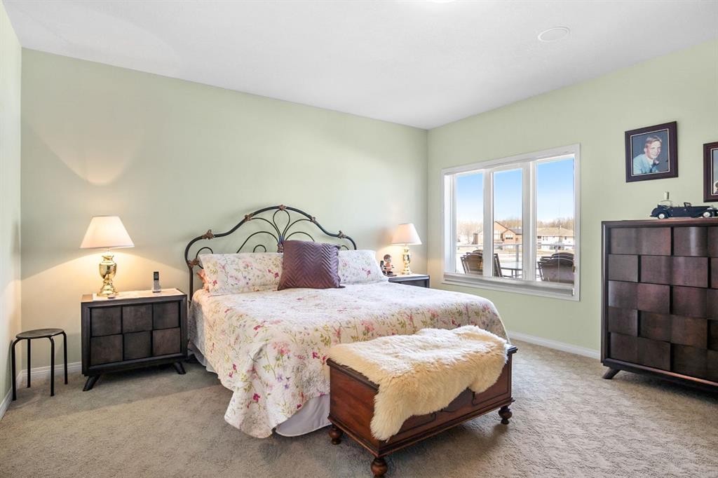 35 Lake Ridge, Olds, AB - Indoor Photo Showing Bedroom