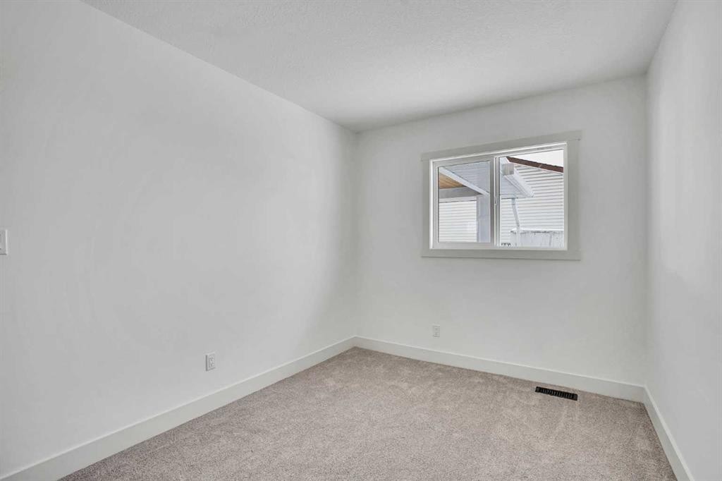 908 Stonehaven Road Sw, Calgary, AB - Indoor Photo Showing Other Room