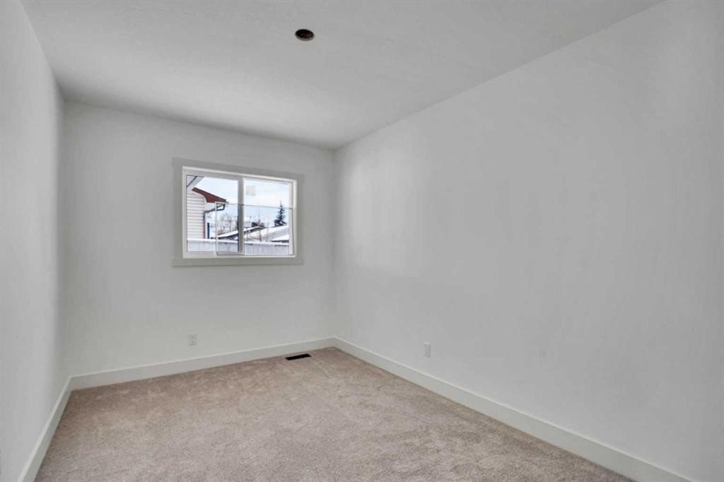 908 Stonehaven Road Sw, Calgary, AB - Indoor Photo Showing Other Room