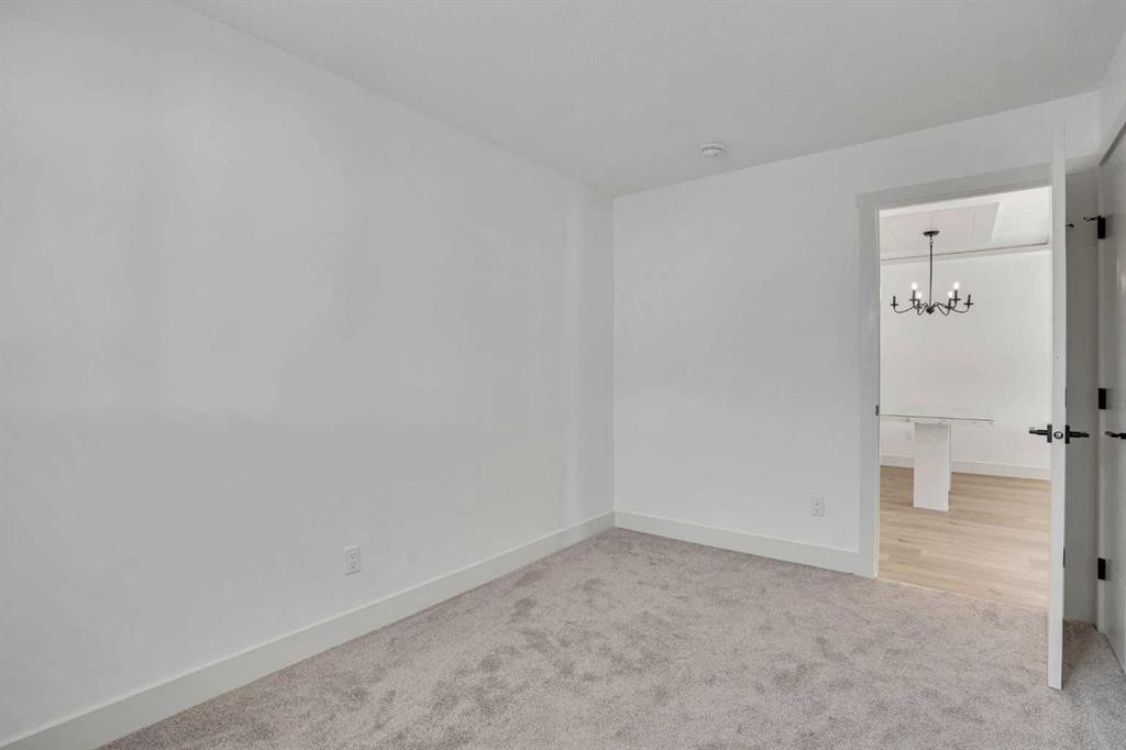 908 Stonehaven Road Sw, Calgary, AB - Indoor Photo Showing Other Room