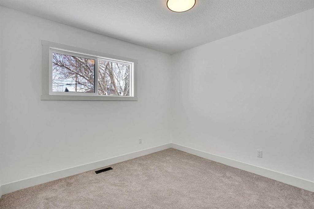 908 Stonehaven Road Sw, Calgary, AB - Indoor Photo Showing Other Room