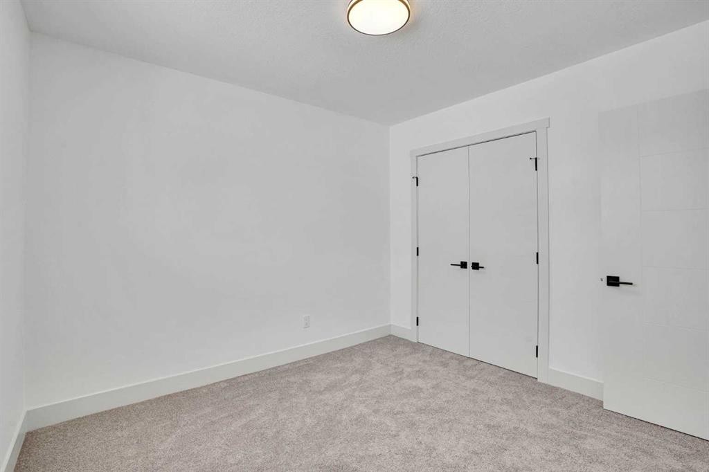 908 Stonehaven Road Sw, Calgary, AB - Indoor Photo Showing Other Room