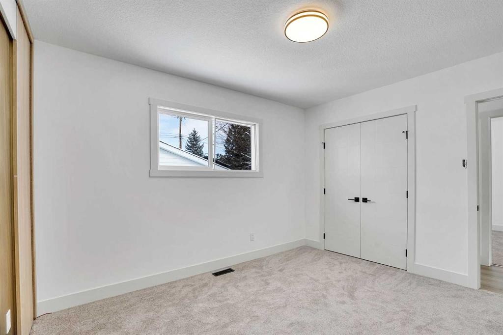908 Stonehaven Road Sw, Calgary, AB - Indoor Photo Showing Other Room