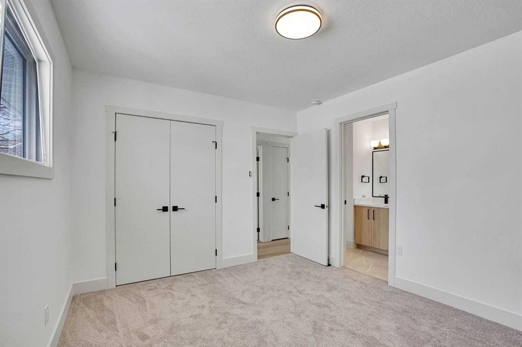 908 Stonehaven Road Sw, Calgary, AB - Indoor Photo Showing Other Room