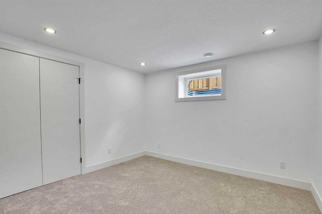 908 Stonehaven Road Sw, Calgary, AB - Indoor Photo Showing Other Room