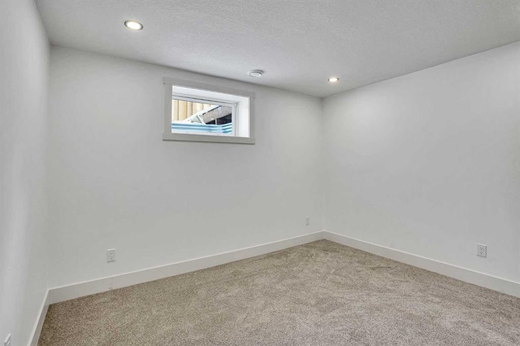 908 Stonehaven Road Sw, Calgary, AB - Indoor Photo Showing Other Room