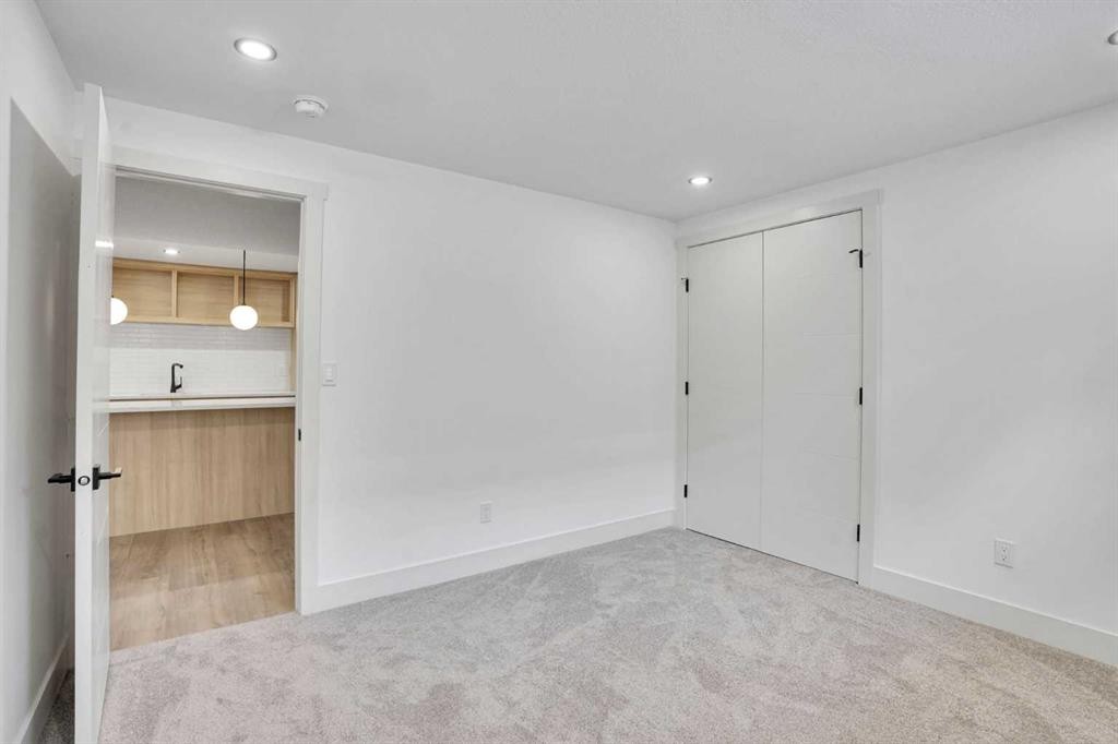 908 Stonehaven Road Sw, Calgary, AB - Indoor Photo Showing Other Room