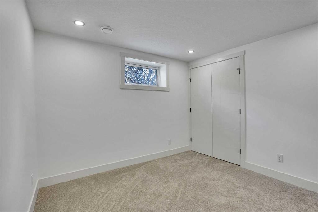 908 Stonehaven Road Sw, Calgary, AB - Indoor Photo Showing Other Room