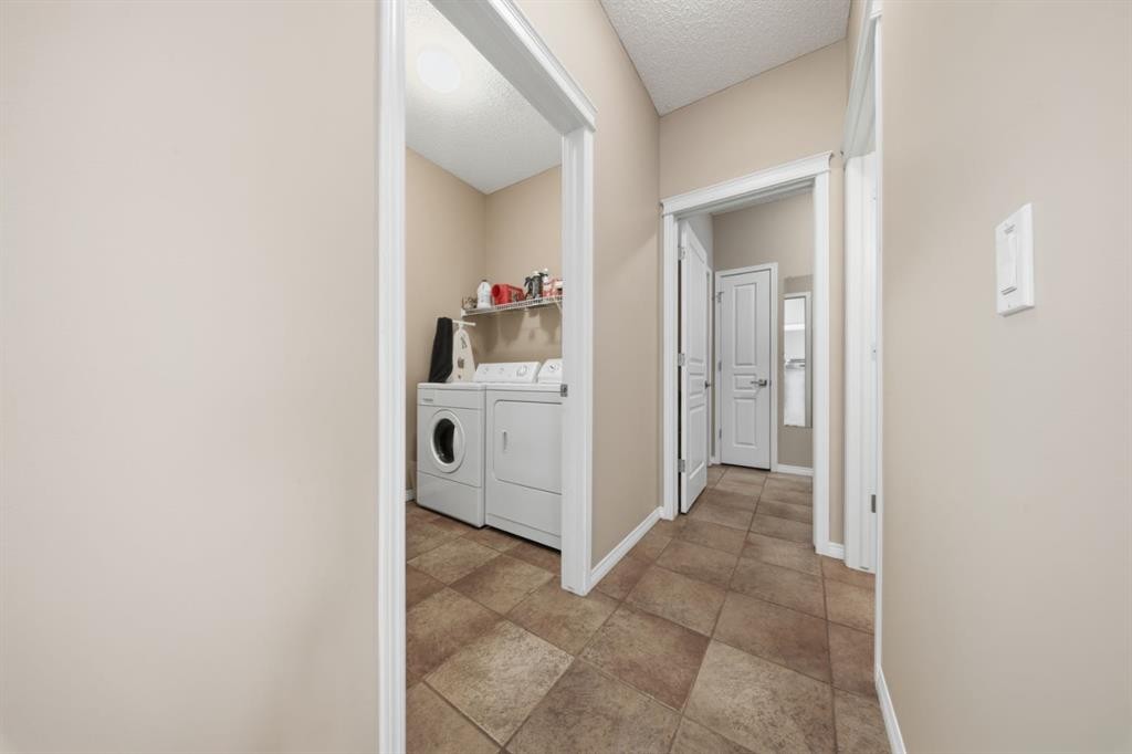 283 Springmere Link, Chestermere, AB - Indoor Photo Showing Laundry Room
