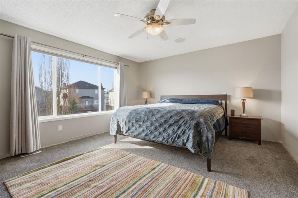 283 Springmere Link, Chestermere, AB - Indoor Photo Showing Bedroom
