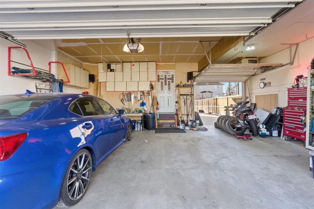 283 Springmere Link, Chestermere, AB - Indoor Photo Showing Garage