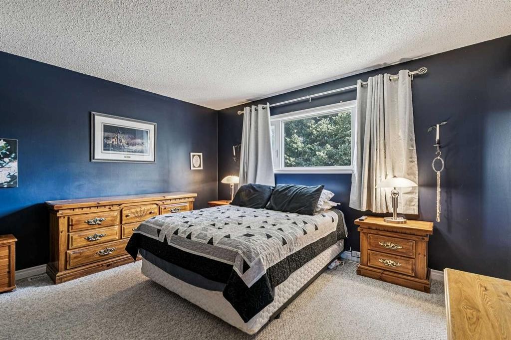 443 Brookmere Crescent Sw, Calgary, AB - Indoor Photo Showing Bedroom