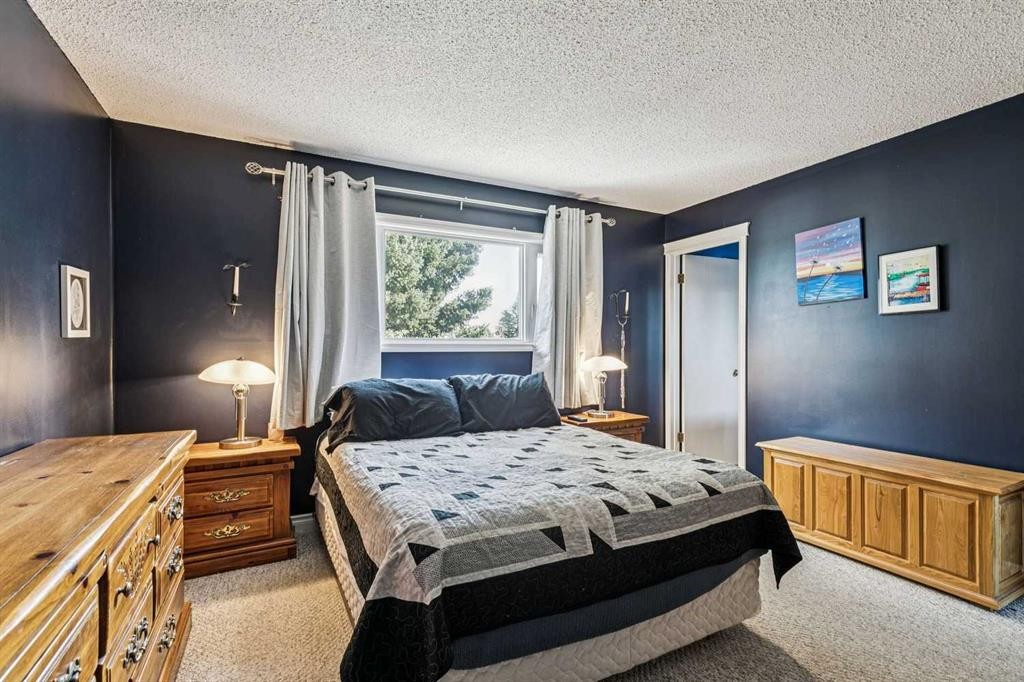 443 Brookmere Crescent Sw, Calgary, AB - Indoor Photo Showing Bedroom
