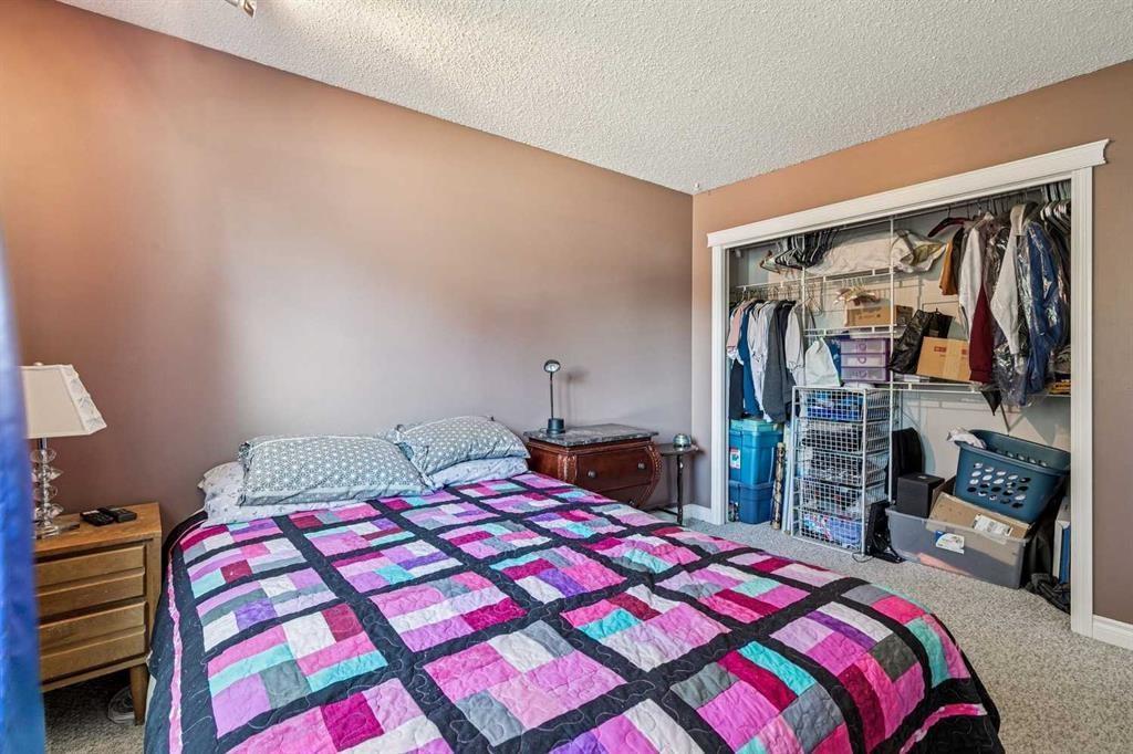 443 Brookmere Crescent Sw, Calgary, AB - Indoor Photo Showing Bedroom