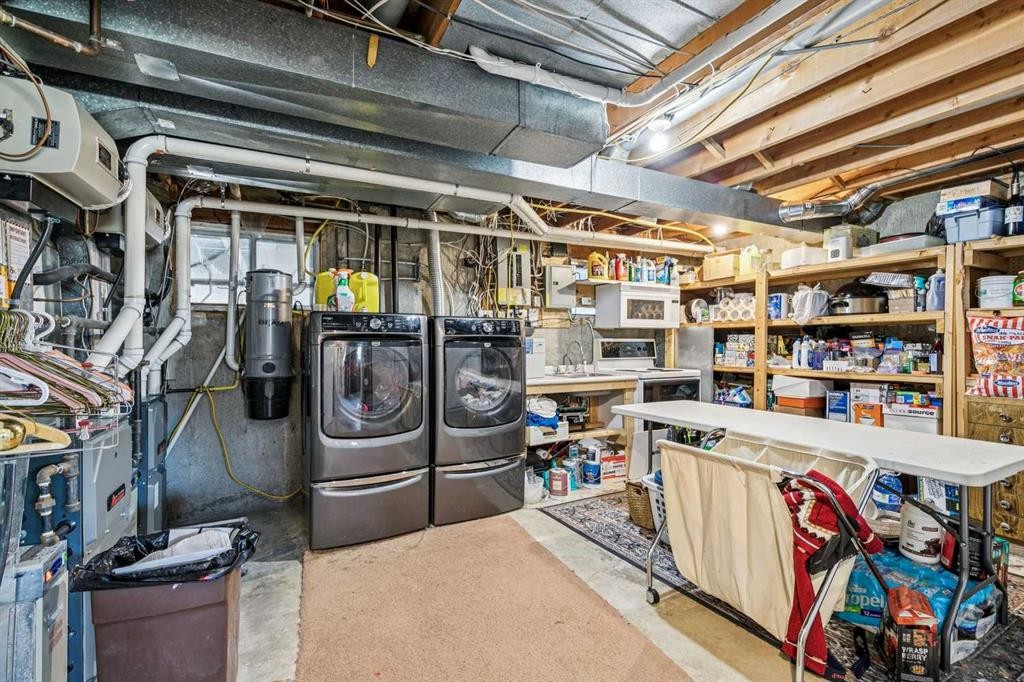 443 Brookmere Crescent Sw, Calgary, AB - Indoor Photo Showing Basement