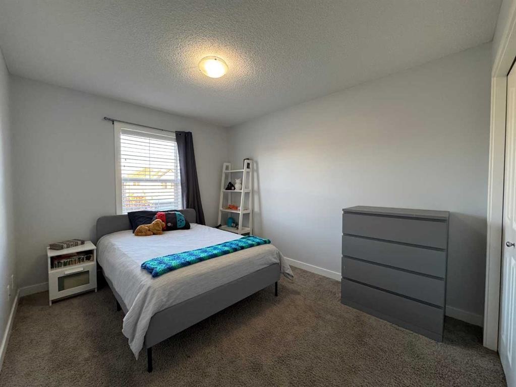 1091 Brightoncrest Green Se, Calgary, AB - Indoor Photo Showing Bedroom