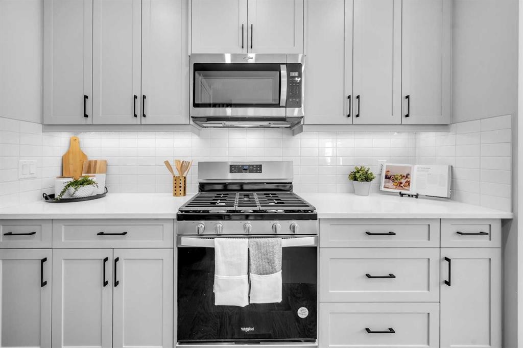 55 Amblehurst Link Nw, Calgary, AB - Indoor Photo Showing Kitchen With Upgraded Kitchen