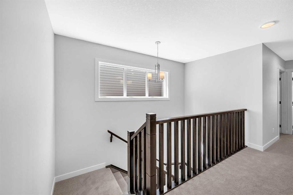 55 Amblehurst Link Nw, Calgary, AB - Indoor Photo Showing Other Room
