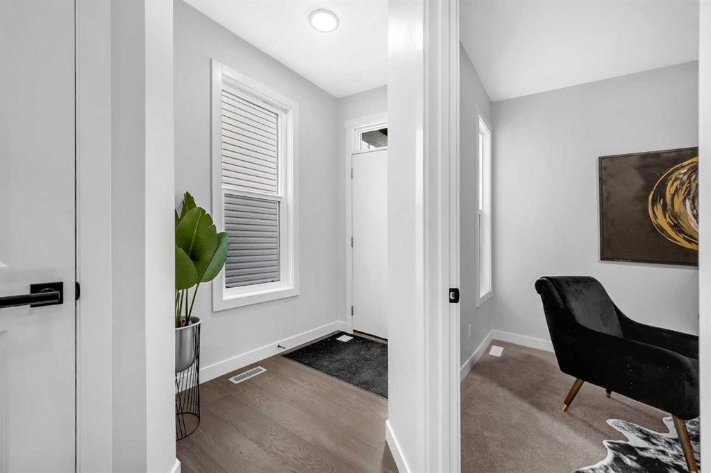 55 Amblehurst Link Nw, Calgary, AB - Indoor Photo Showing Other Room