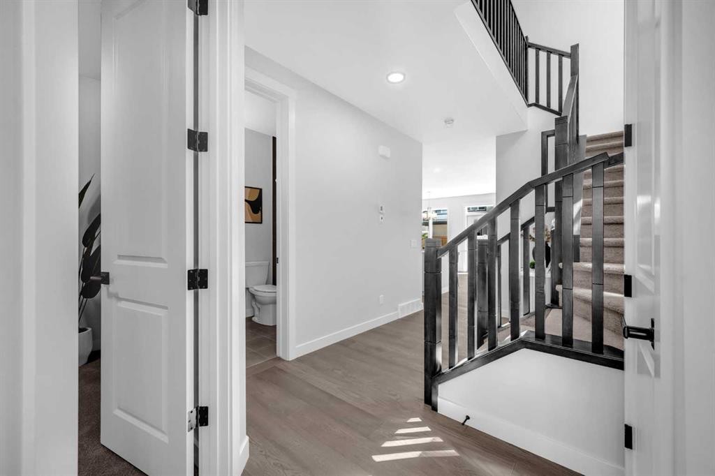 55 Amblehurst Link Nw, Calgary, AB - Indoor Photo Showing Other Room