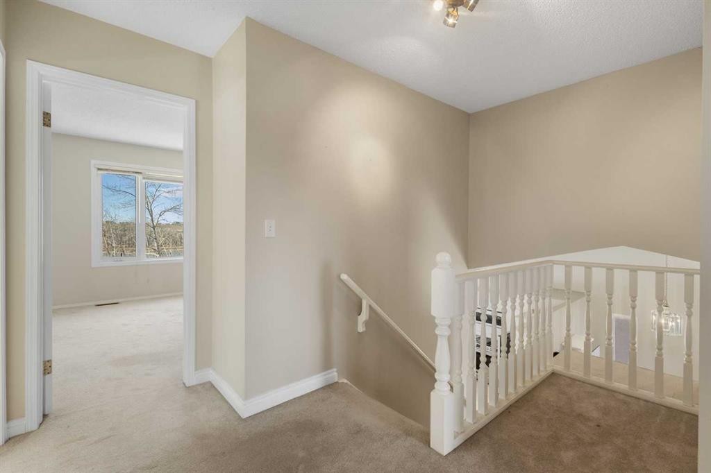 103 Riverside Way Se, Calgary, AB - Indoor Photo Showing Other Room