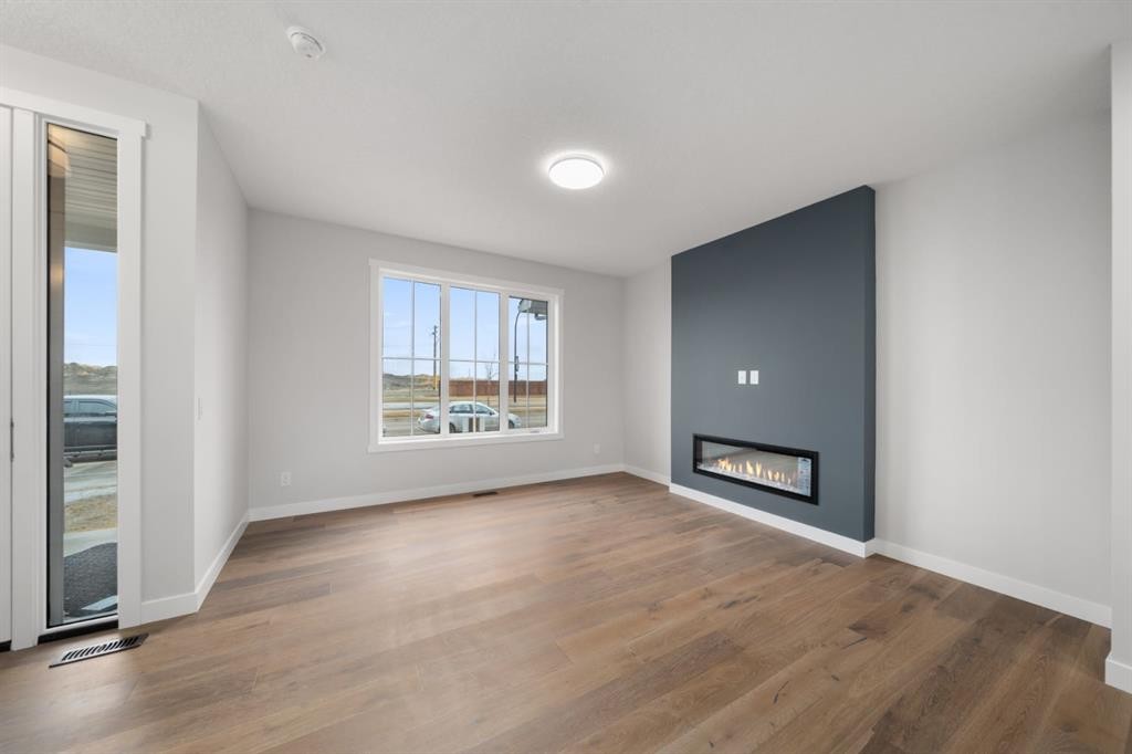 37 Sora Gate Se, Calgary, AB - Indoor With Fireplace