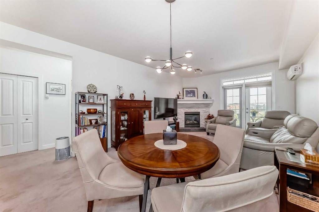 211-1005A Westmount Drive, Strathmore, AB - Indoor With Fireplace