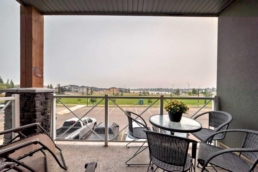211-1005A Westmount Drive, Strathmore, AB - Outdoor With Balcony With Exterior