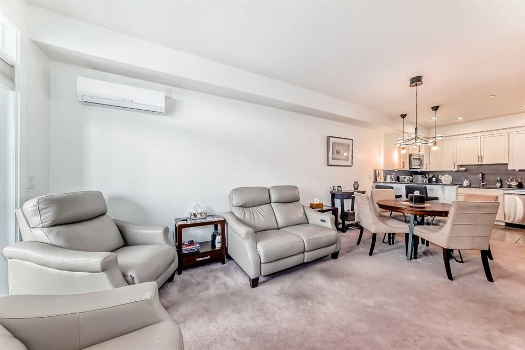 211-1005A Westmount Drive, Strathmore, AB - Indoor Photo Showing Living Room