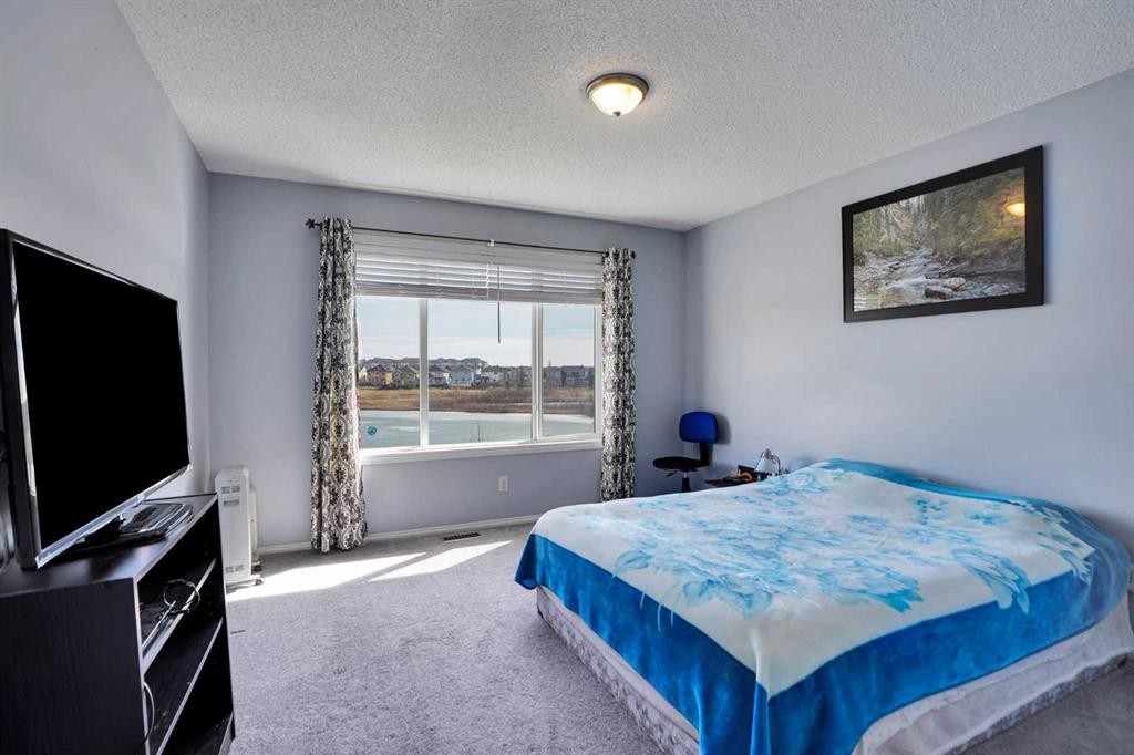 234 Saddlecreek Point Ne, Calgary, AB - Indoor Photo Showing Bedroom