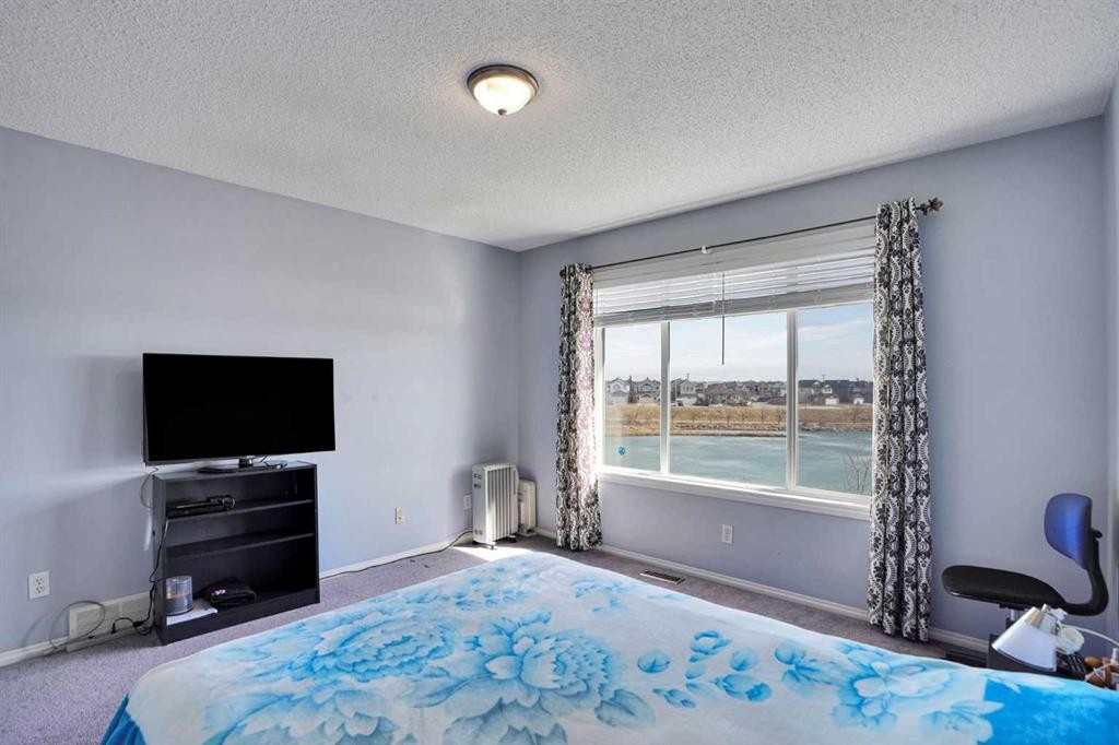 234 Saddlecreek Point Ne, Calgary, AB - Indoor Photo Showing Bedroom