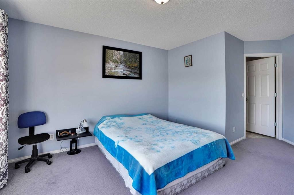 234 Saddlecreek Point Ne, Calgary, AB - Indoor Photo Showing Bedroom