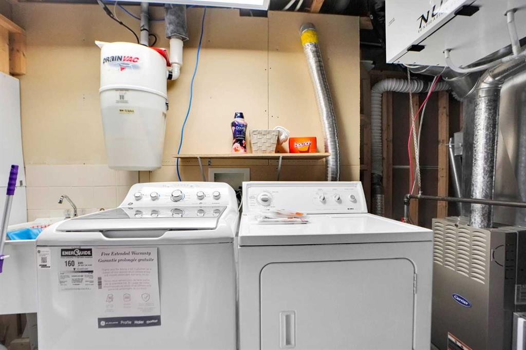 234 Saddlecreek Point Ne, Calgary, AB - Indoor Photo Showing Laundry Room
