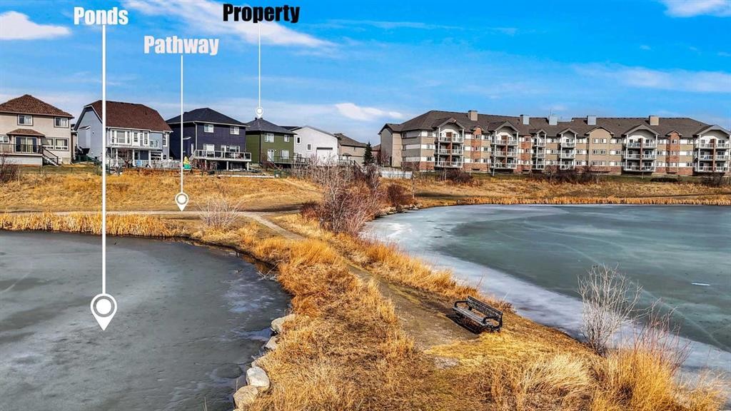 234 Saddlecreek Point Ne, Calgary, AB - Outdoor With Body Of Water