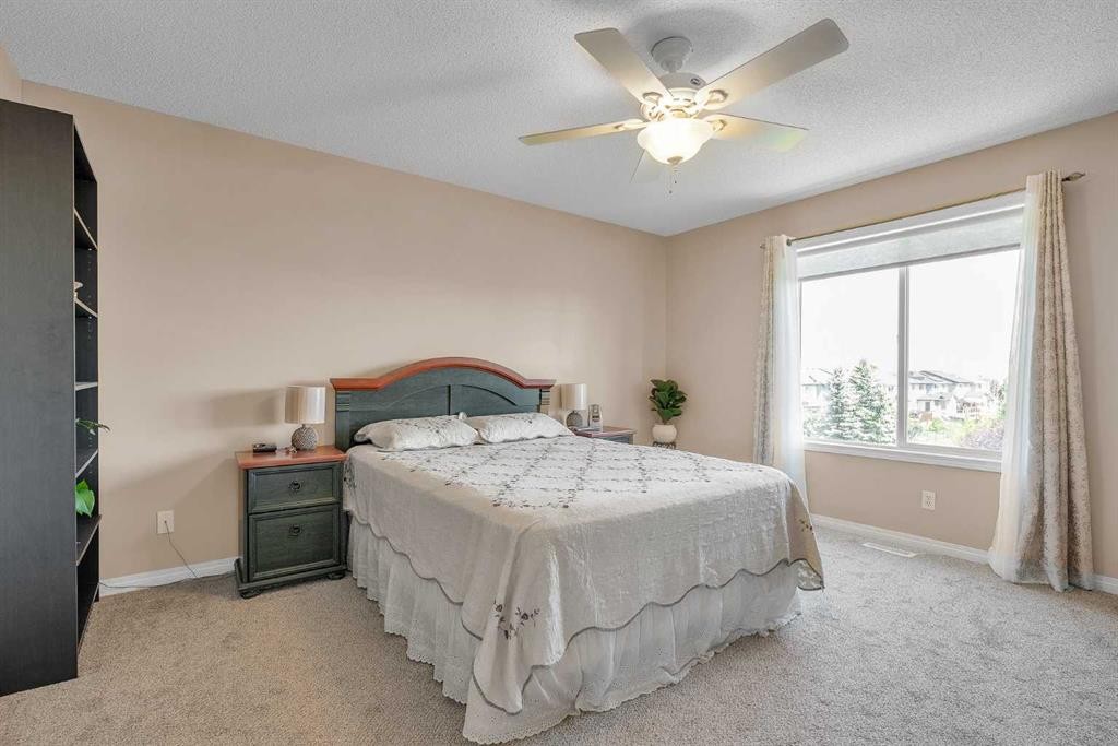 320 Evermeadow Road Sw, Calgary, AB - Indoor Photo Showing Bedroom