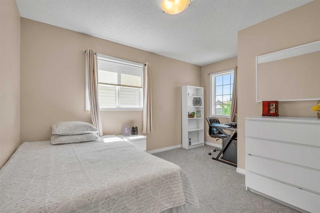 320 Evermeadow Road Sw, Calgary, AB - Indoor Photo Showing Bedroom
