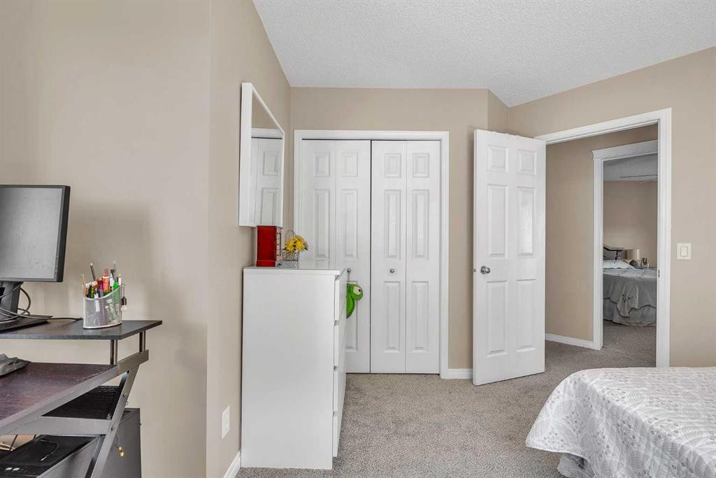 320 Evermeadow Road Sw, Calgary, AB - Indoor Photo Showing Bedroom