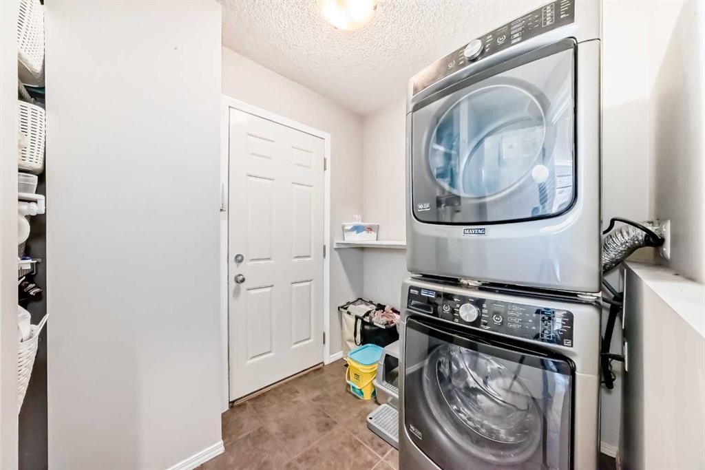 377 Cimarron Boulevard, Okotoks, AB - Indoor Photo Showing Laundry Room