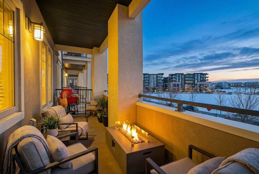 214-140 Mahogany Street Se, Calgary, AB - Outdoor With Body Of Water With Balcony