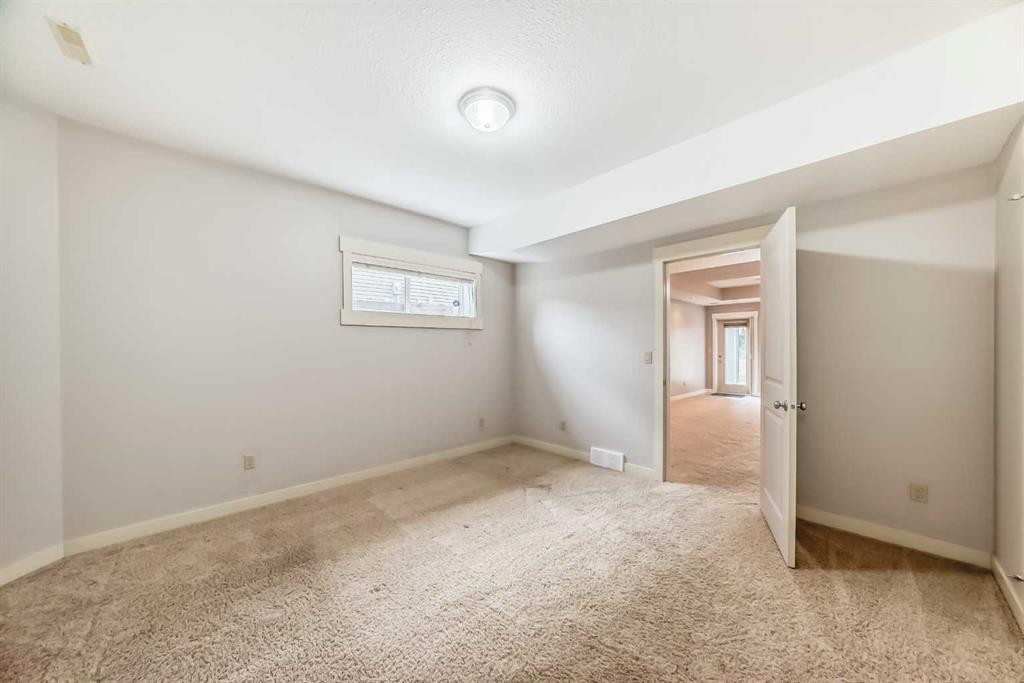 160 Sienna Passage, Chestermere, AB - Indoor Photo Showing Other Room