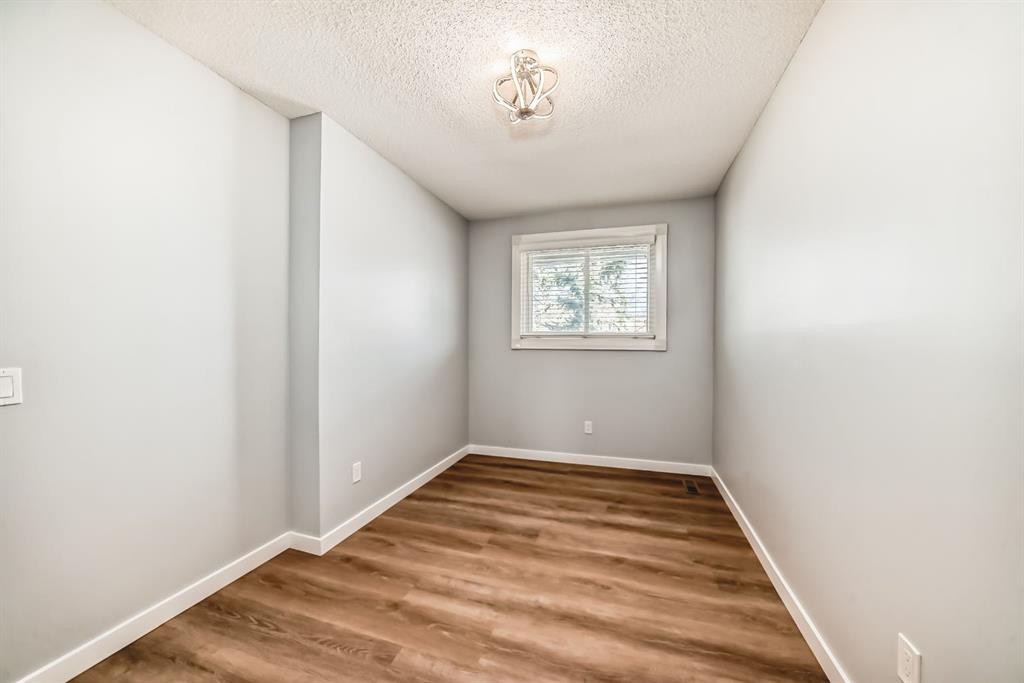 161-6915 Ranchview Drive Nw, Calgary, AB - Indoor Photo Showing Other Room