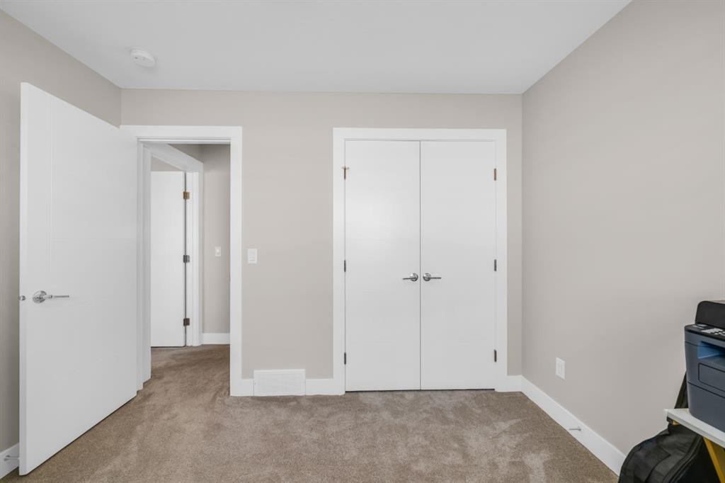 163 Sandpiper Bend, Chestermere, AB - Indoor Photo Showing Other Room