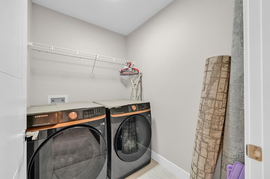 163 Sandpiper Bend, Chestermere, AB - Indoor Photo Showing Laundry Room