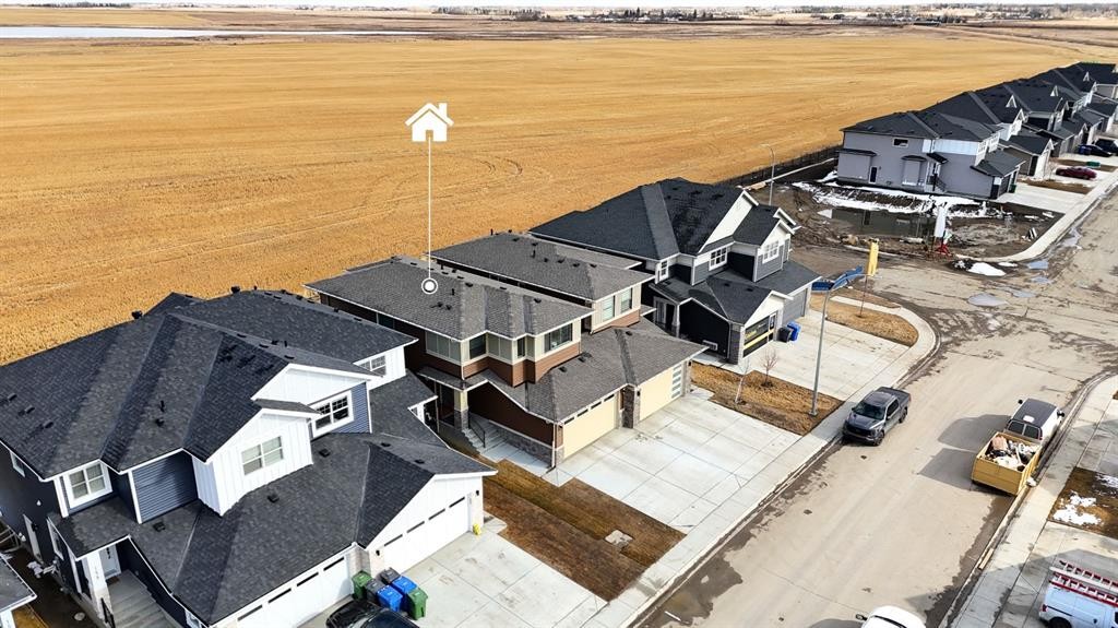 163 Sandpiper Bend, Chestermere, AB - Outdoor With Body Of Water