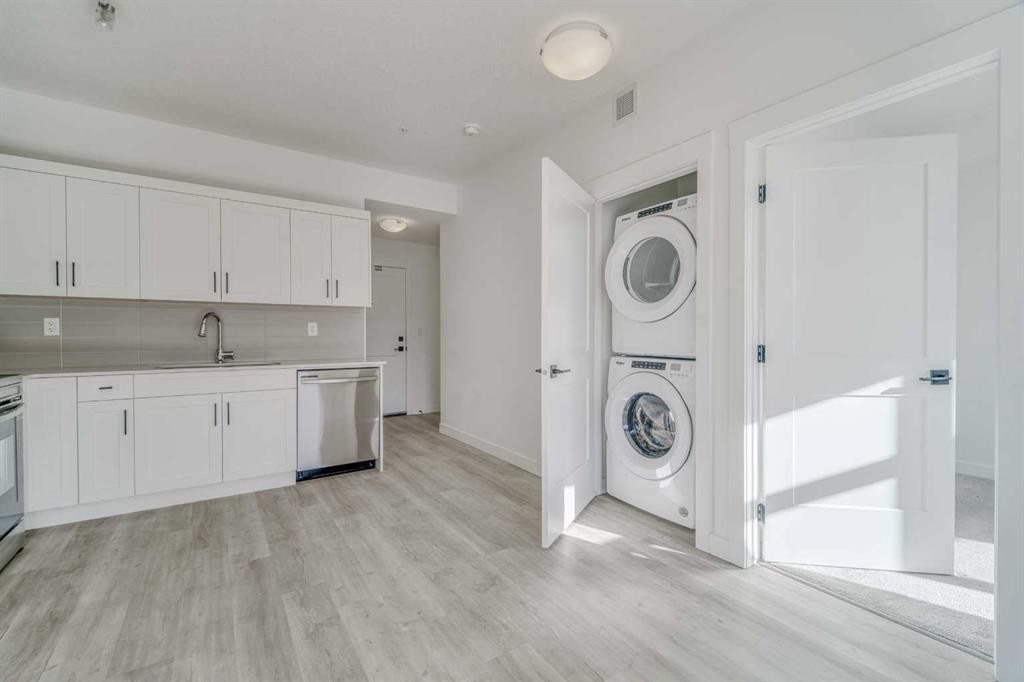 213-40 Sage Hill Walk Nw, Calgary, AB - Indoor Photo Showing Laundry Room