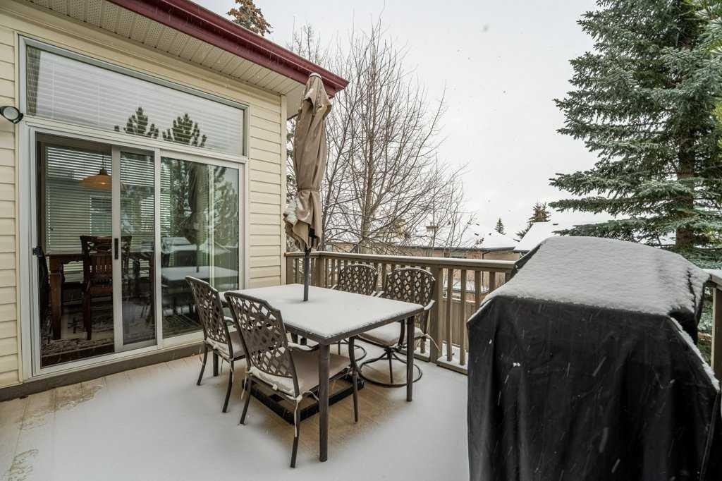 62 Springbluff Boulevard Sw, Calgary, AB - Outdoor With Deck Patio Veranda With Exterior