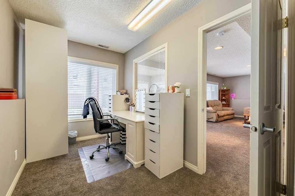 62 Springbluff Boulevard Sw, Calgary, AB - Indoor Photo Showing Office