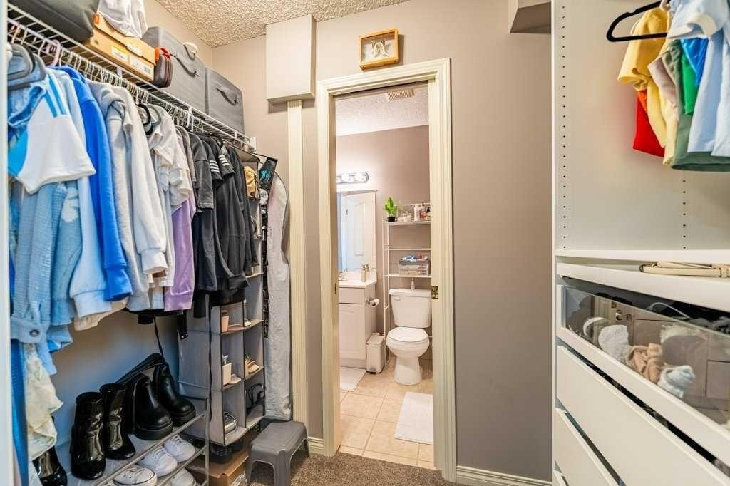 62 Springbluff Boulevard Sw, Calgary, AB - Indoor With Storage